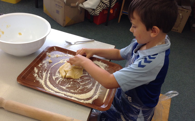 Student at St Wilfrids in a cooking after school club